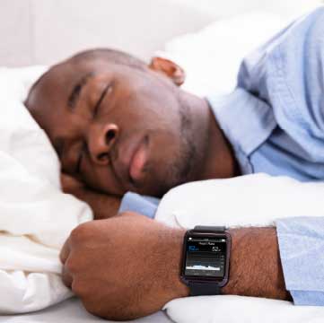 Man sleeps with a watch on