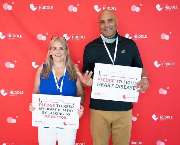 Still and his wife, Liz, pledge to fight heart disease at an event for The Huddle Study. 