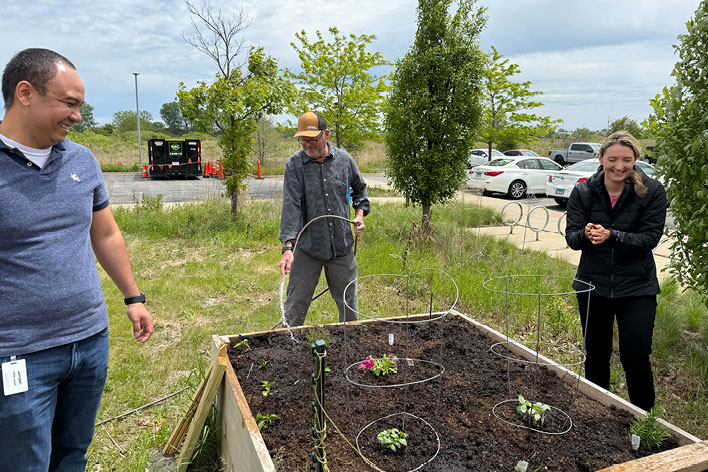 Staff tends to the CHEST garden