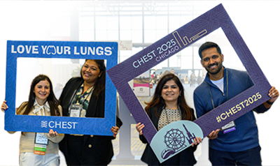 Annual Meeting attendees posing with a Love Your Lungs frame