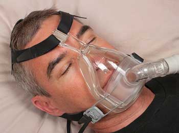 Image of a man on a ventilator