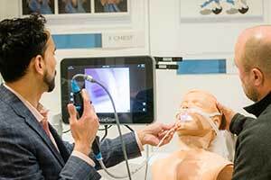 Attendee and instructor during a simulation