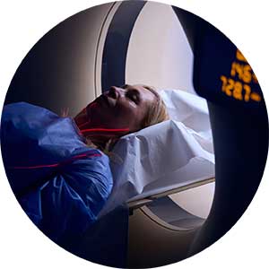 Woman getting a CT scan of her chest