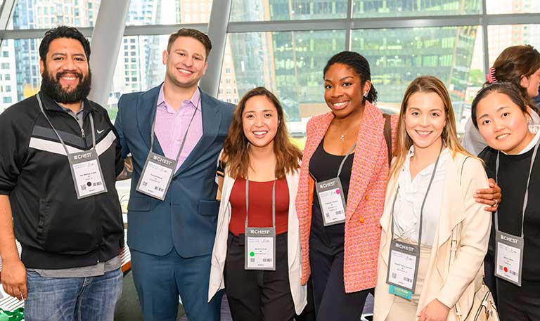 A group of smiling network members