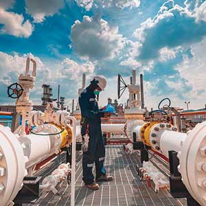 A person working at an oil factory