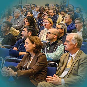 People sitting at an annual meeting conference