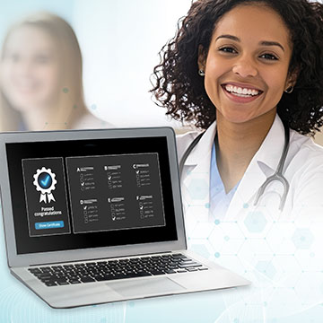 A woman smiles with the APP Certification Exam displayed on a computer